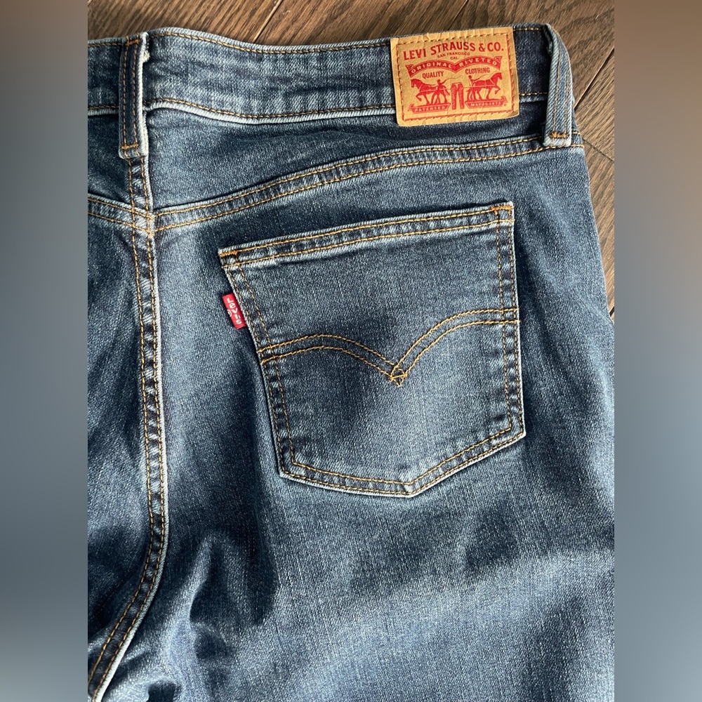 Levi's women’s  Blue Jeans —SUPERLOW BOOT 33

Washed but never worn